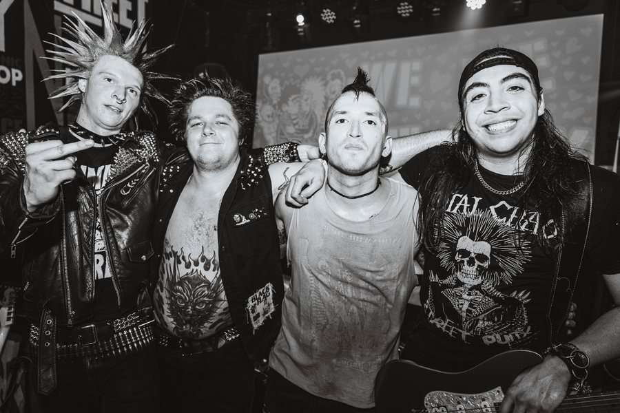 Noogy after their set, arms around each other
