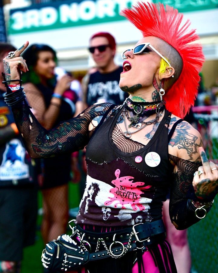 Punk with a red mohawk singing along at Punk Rock Bowling, Las Vegas