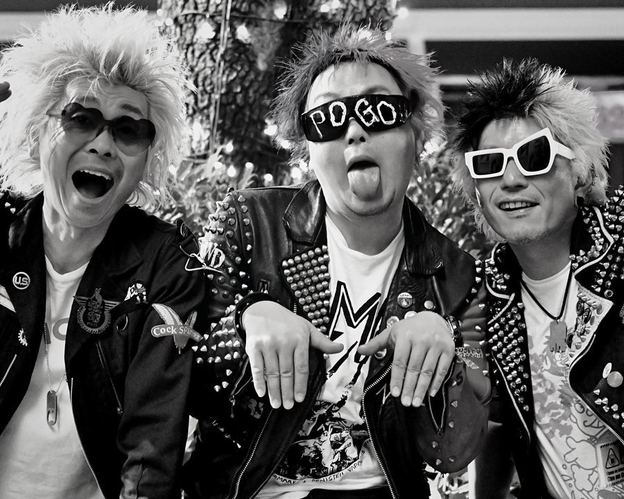 Shit-Faced, three spiked-hair punks mugging for the camera